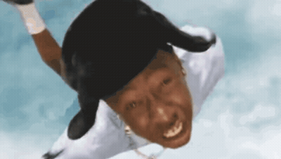 Man Flying Through Air In Baseball Cap GIF