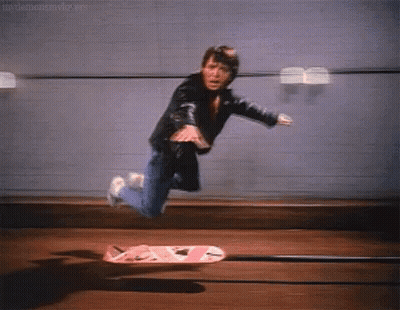 Man Flying Through Air Riding Skateboard GIF