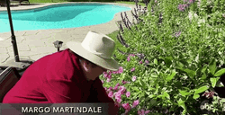 Man Gardening And Drinkin G Wine