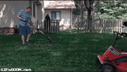 Man Gardening With Dog