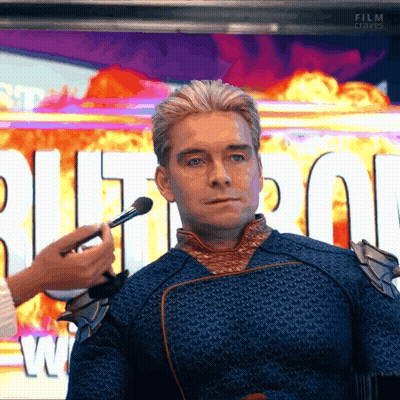 Man Getting Face Painted Beside Film Claves Sign GIF