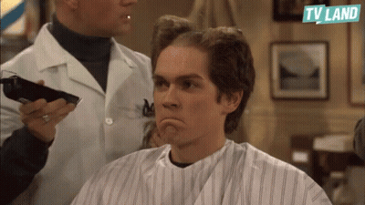 Man Getting Haircut At Barber Shop With TV Land Logo GIF