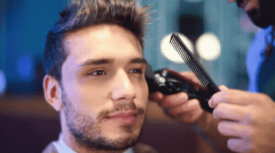 Man Getting Haircut By Barber With Comb GIF