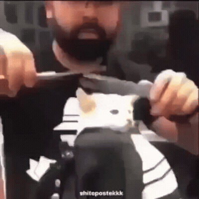 Man Getting Haircut While Wearing Helmet GIF