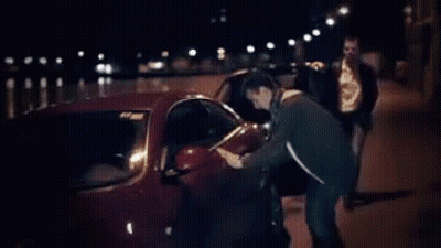 Man Getting Out Of Car At Night GIF