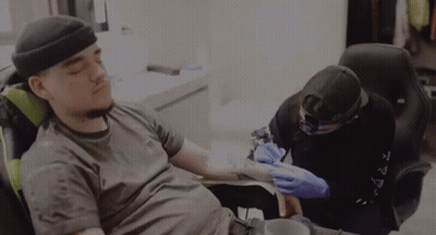 Man Getting Tattoo Wearing Black Hat GIF