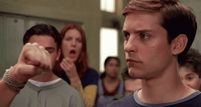 Man Giving Fist Bump In Front Of Crowd GIF