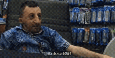 Man Giving High Five In Store Sitting In Chair GIF