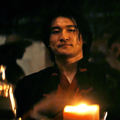 Man Giving Middle Finger Near Candle GIF