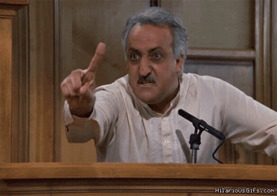 Man Giving Speech At Microphone GIF