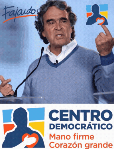Man Giving Speech In Front Of Centro Democratico Sign GIF