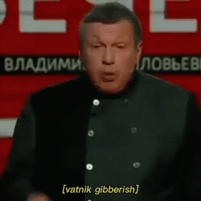 Man Giving Speech In Front Of Vatnik Gibberish Sign GIF