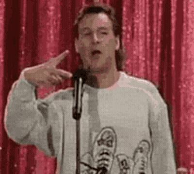 Man Giving Speech In Sweater With Shoes GIF