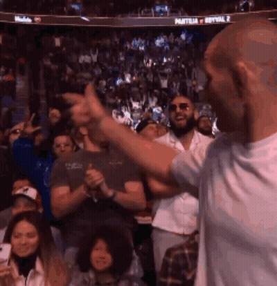 Man Giving Thumbs Up At Sports Event GIF