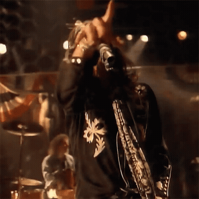 Man Giving Thumbs Up Holding Microphone Saying You GIF