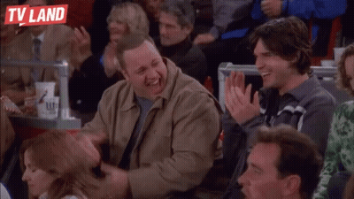Man Giving Thumbs Up In Crowd With TV Land Logo GIF