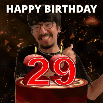 Man Giving Thumbs Up In Front Of 29 Birthday Cake GIF