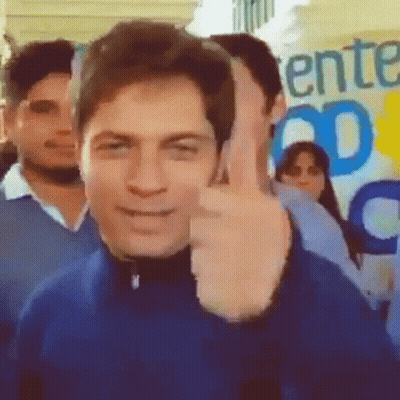 Man Giving Thumbs Up In Front Of Ent Sign GIF