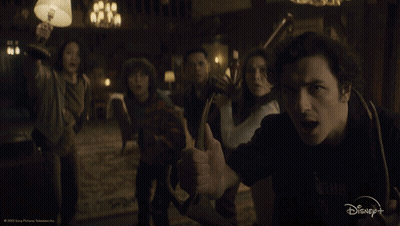 Man Giving Thumbs Up In Front Of Group Saying What GIF