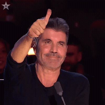 Man Giving Thumbs Up In Front Of Microphone GIF