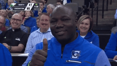 Man Giving Thumbs Up Watching Basketball GIF