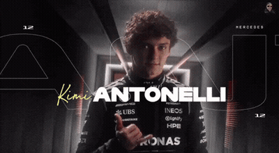 Man Giving Thumbs Up With Antonelli Behind GIF