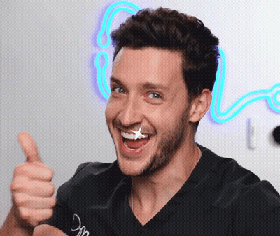 Man Giving Thumbs Up With Star On Face GIF