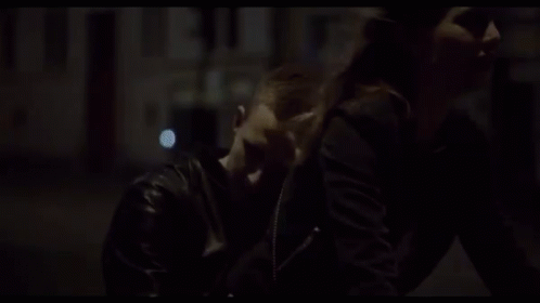 Man Giving Woman Piggyback Ride GIF