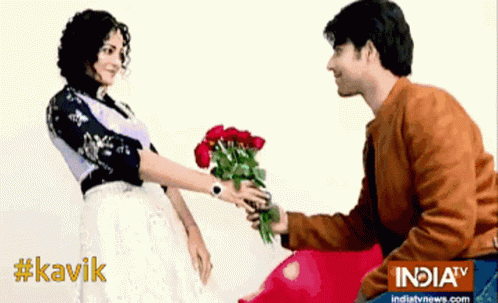 Man Giving Woman Red Roses #Kavik GIF