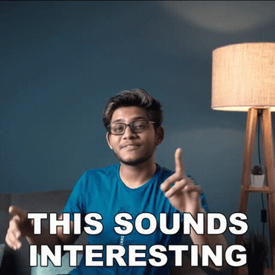 Man Glasses Blue Shirt Saying This Sounds Interesting GIF
