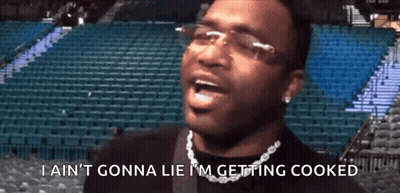 Man Glasses Chain Says Im Getting Cooked GIF