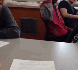 Man Grabbing Paper GIF