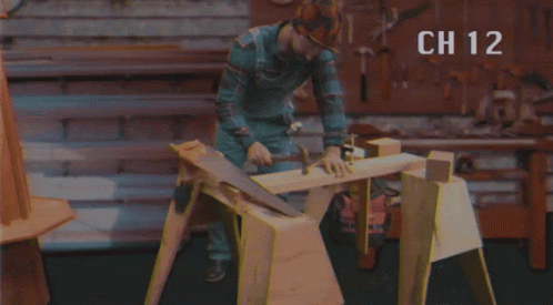 Man Hammering Nail With Ch 12 Above GIF