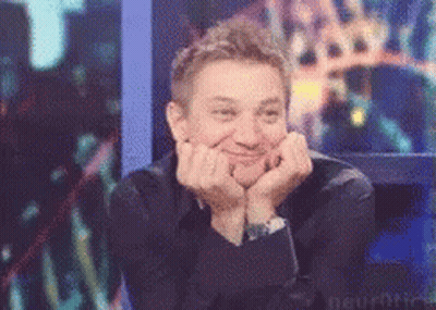 Man Hands On Face Smiling At Camera GIF