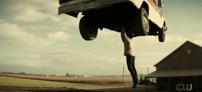 Man Hanging Upside Down From Truck GIF
