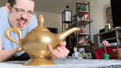 Man Happy For Having Genie Lamp GIF