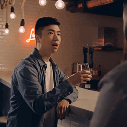 Man Having Conversation And Sipping Wine Stank Face GIF