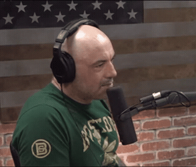 Man Headphones Green 'Boston' Shirt Talks Into Mic GIF
