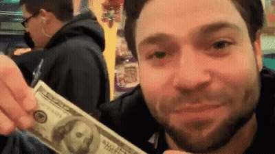 Man Holding 100 Dollar Bill GIF