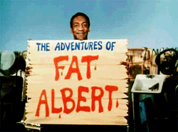 Man Holding A Fat Albert Poster  GIF