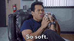 Man Holding A Soft Blanket GIF