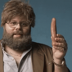 Man Holding A Soft Sausage GIF