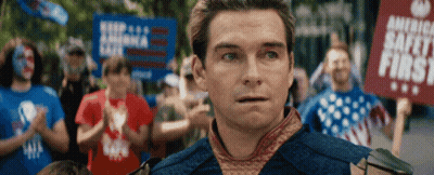 Man Holding America Safety First Sign GIF