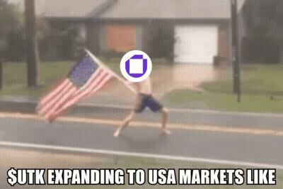 Man Holding American Flag $ Utk Expanding To Markets GIF