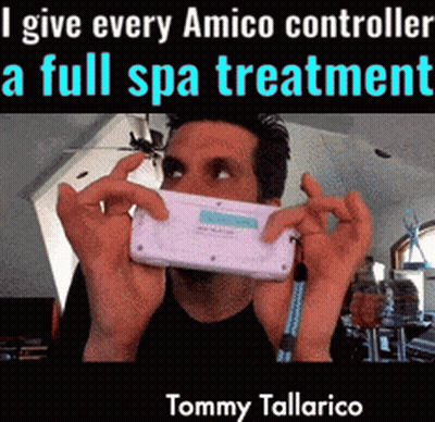 Man Holding Amico Controller With Caption I Give Every Amico Controller A Full Sp GIF