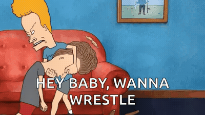 Man Holding Another On Couch GIF