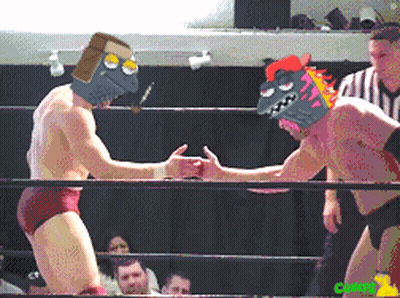 Man Holding Another On Shoulders In Wrestling Ring GIF