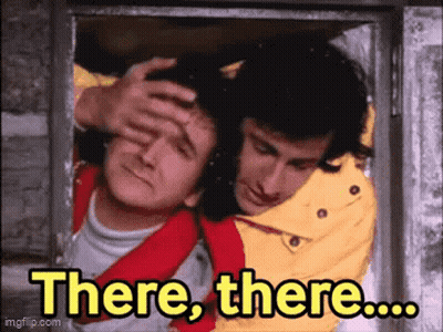 Man Holding Another's Head Saying There, There GIF
