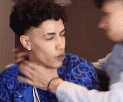 Man Holding Another's Neck GIF