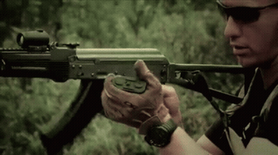 Man Holding Assault Rifle GIF